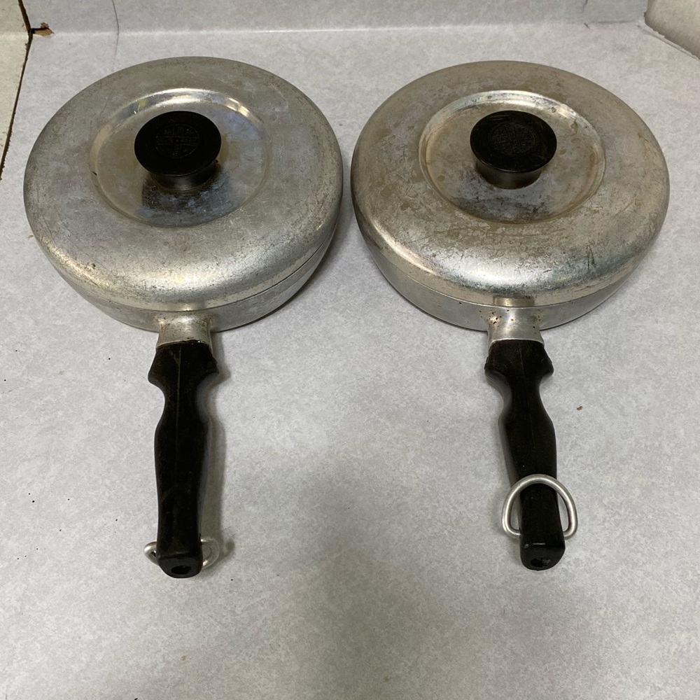 Pair of WearEver shallow pans with original lids